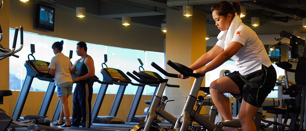 Micasa All Suites Hotel Kuala Lumpur Exterior foto A woman on a stationary bicycle